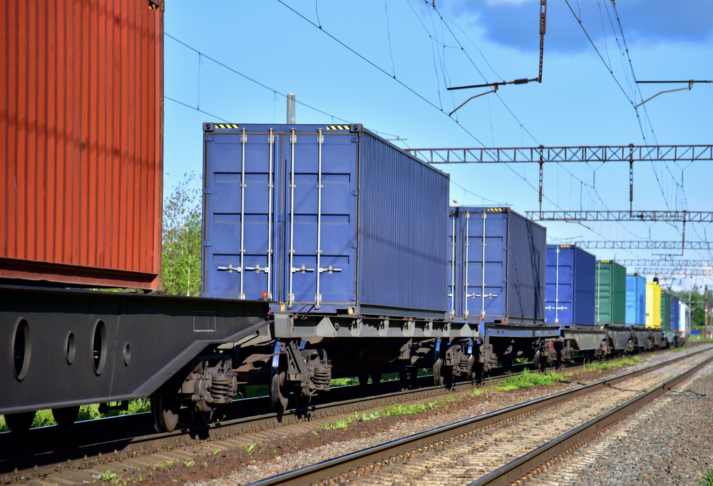 JPS intermodal train on railway going through North America and Mexico