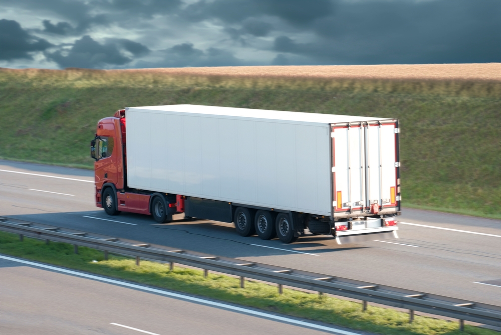 JPS transportation truck driving on highway