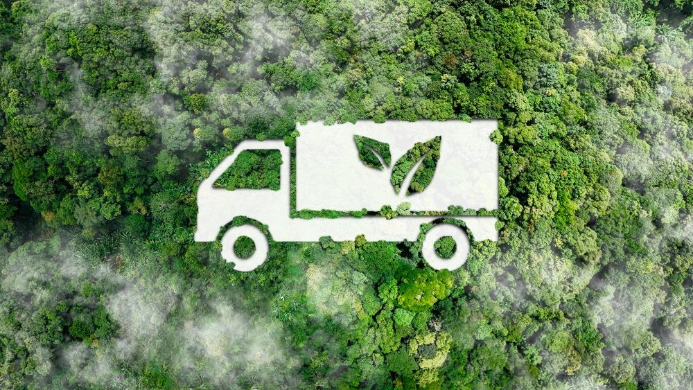 symbol of green and sustainable transportation truck on a bed of green forrest